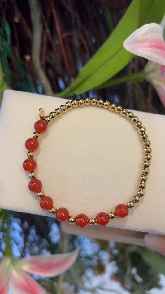 strech armband goud rood