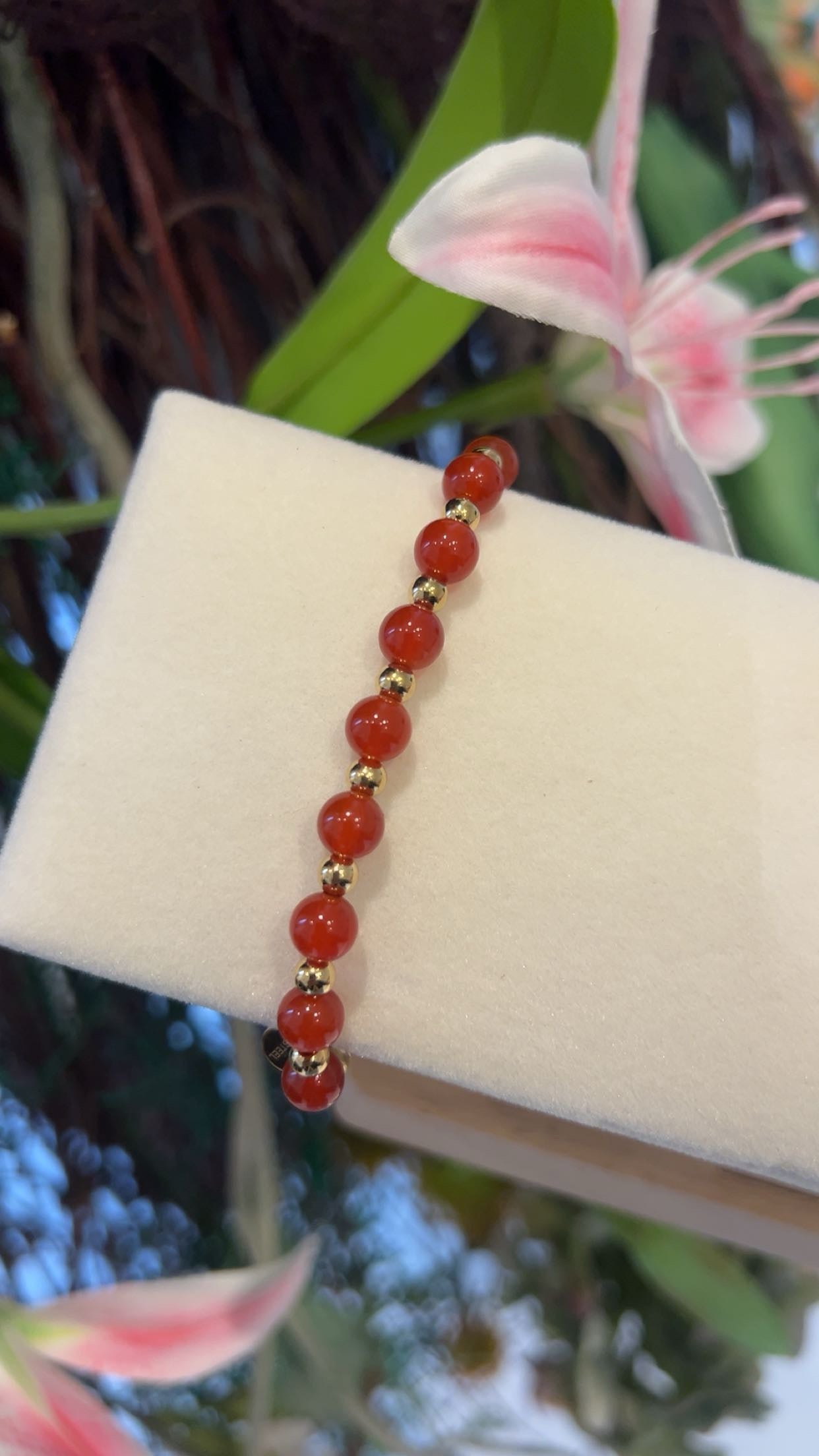 strech armband goud rood