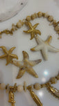 Starfish earrings beige